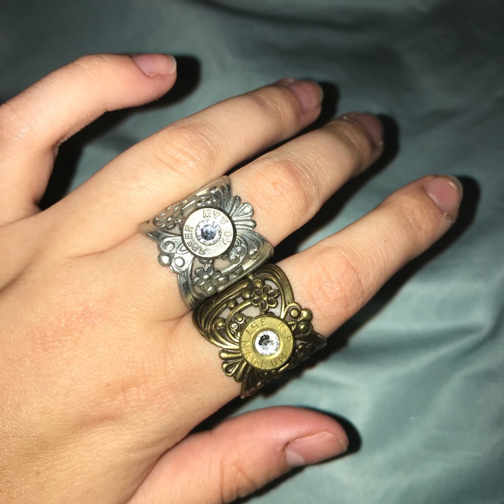 Hardly worn gold and silver colored bullet rings